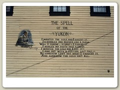 Spell of the Yukon on side of building in Dawson City