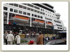 Our ship is docked and passengers departing