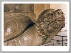 Stone monuments along long walkway